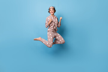 Full size profile photo of optimistic short hairdo lady jump wear beige pajama mask isolated on...