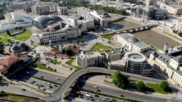 A panoramic drone view of the city of Skopje in northern Macedonia. Drone view of the stone bridge over the Vardar River. The central square in Skopje from above.