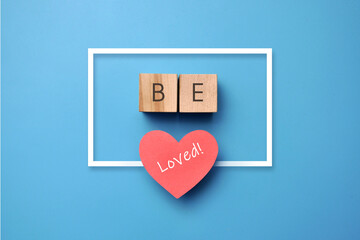 An unusual inscription on the cubes and a heart : Be happy! Wishing happiness to a loved one