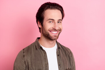Profile side photo of young cheerful handsome man happy positive smile confident isolated over pink color background