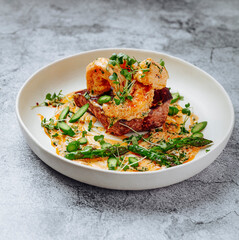 Тop sirloin steak, asparagus, shrimp and shrimp sauce with butter and garlic