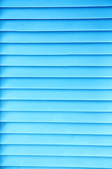 Obraz premium Classic blue louvered doors. Wooden doors. Abstract geometric background