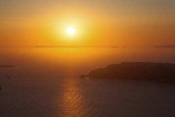Greece santorini island in cyclades,the most famous sunset of the world above caldera view over sea