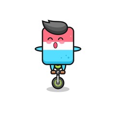 The cute eraser character is riding a circus bike