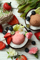 Concept of delicious fruit ice cream on wooden table