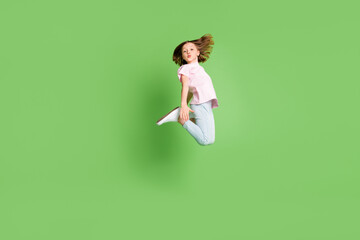 Full body profile side photo of young girl happy positive smile jump pouted lips isolated over...
