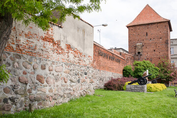 Nowe Miasto Lubawskie, Poland - Fragments of ramparts and a Gothic gate, Medieval architecture.