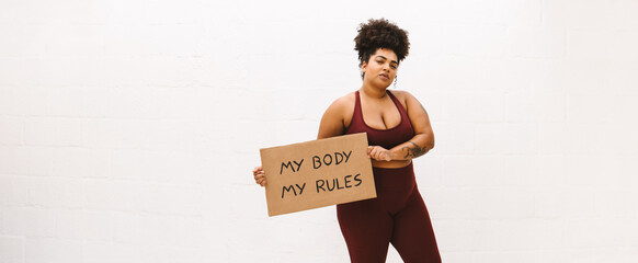 Woman holding banner of 