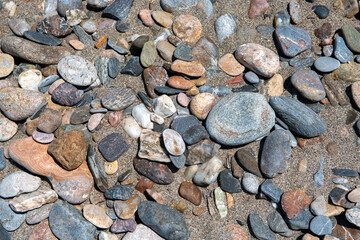 background-texture of beach stones and sand