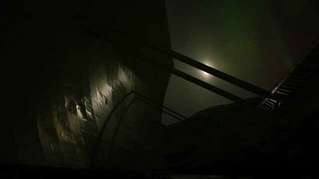 EISCAT, time lapse of a polar research station close in Norway, Troms&oslash;, at night to day with aurora borealis (northern lights)