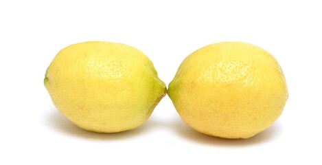 2 ripe yellow lemons on a white background