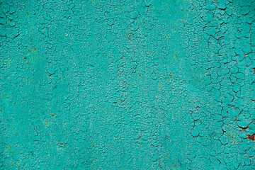 Aged turquoise blue green weathered background with cracks and rust or grunge rough surface...