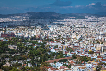 Fototapeta na wymiar Athens cityscape and Hephaestus temple, view from Acropolis hill, Greece