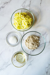 ingredients for making zucchini pancakes 
