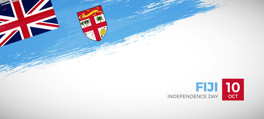 Happy independence day of Fiji with brush painted grunge flag background
