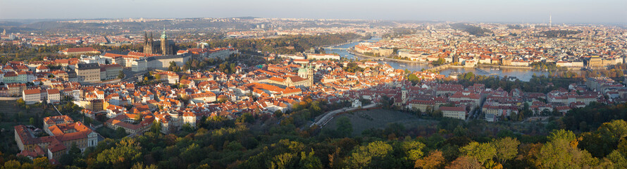 Fototapeta na wymiar Prague - The panorama of the Town from Petrin in the sunset light.