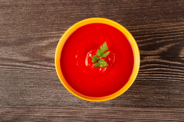 Delicious homemade tomato soup in bowl.