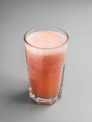 Delicious grapefruit fresh in a beautiful glass with cream
