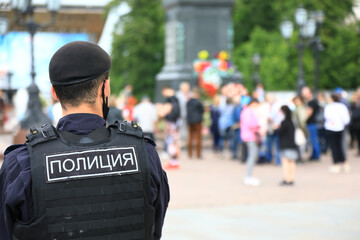Russian policeman keeps order