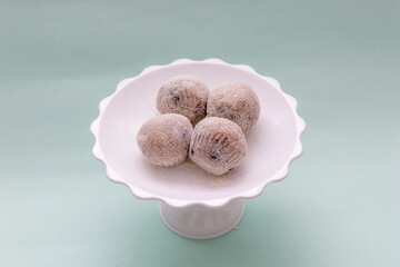sweet known as beijinho de coco, very popular in Brazilian parties.