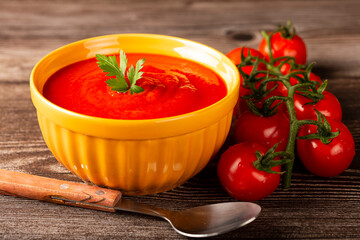 Delicious homemade tomato soup in bowl.