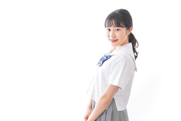 制服を着た笑顔の女子高校生