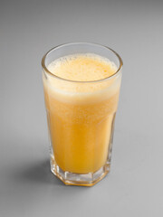 Delicious orange juice in a beautiful glass