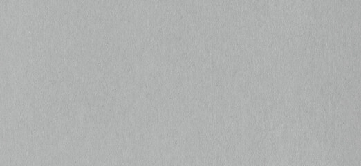 Clean grey cardboard paper background texture. Horizontal banner