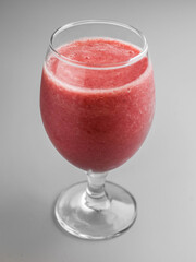 Raspberry smoothie in a beautiful glass