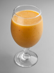 Sea buckthorn smoothie in a beautiful glass