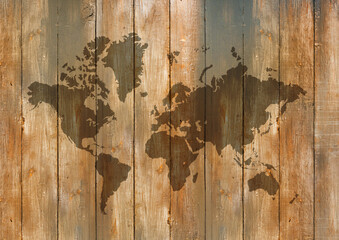 World map on old wooden wall background