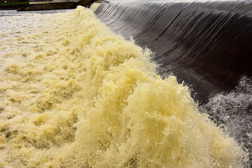 Low Head Dams like this one on the Mississippi river change water level and create very turbulent conditions immediately downstream.