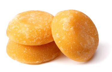 three cakes of palm sugar isolated on white background