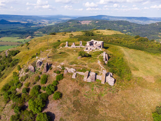 Aerial view of the castle ruins at the top of Csobanc hill in the Balaton upland near Badacsony - 438189355