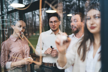 Confident colleagues working on business plan