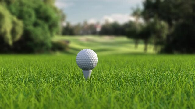 hitting a golf ball with a club on the field side view in slow motion