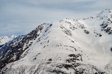 Panorama of a beautiful mountain landscape in the Elbrus region of Kabardino-Balkaria. Mountains in the snow