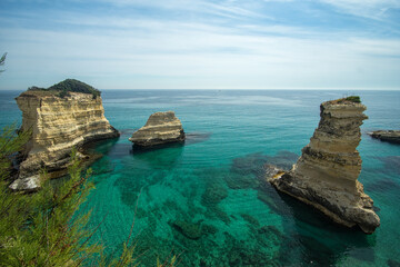 Obraz premium Torre dell'Orso, with its high cliffs and blue sea, in Salento, Puglia, Italy