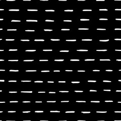 Seamless geometric pattern with abstract white brush strokes on black background.