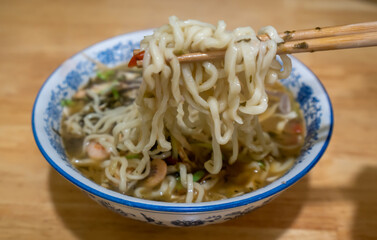 A bowl of steaming seafood Ramen
