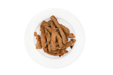Top view of fried crispy pork belly cooked with pepper and garlic on modern ceramic dish isolated on white backgound with clipping path.
