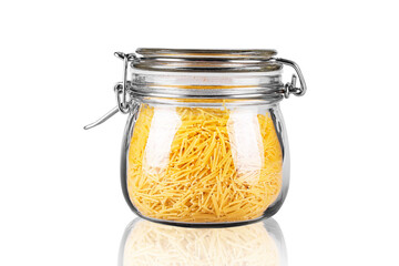 pasta in a glass jar on a white background isolated