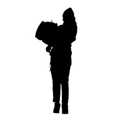 Silhouette of a young female posing for the camera. 