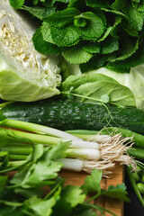 Obraz premium Close up Green vegetables, dark leafy food background.