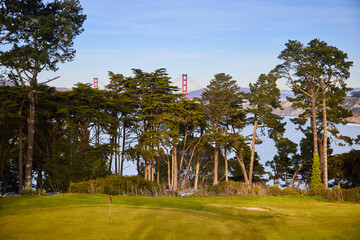 A golf course in San Francisco. In the background you can see the world famous Golden Gate Bridge....
