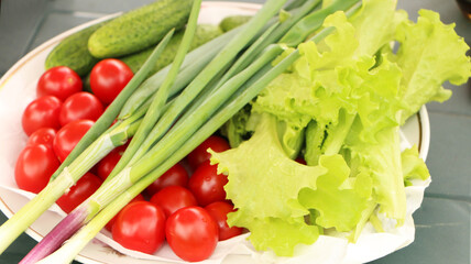 Organic vegetables on a white tray. Healthy eating with fresh vegetables.