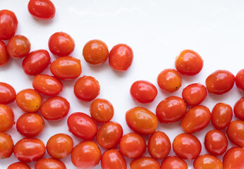 High angle view of full frame image of bright red tomatoes.Suitable for food background or artwork.