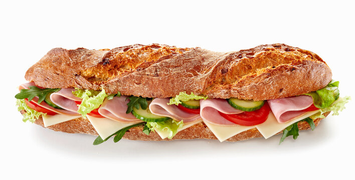 Delicious baguette sandwich with ham on table