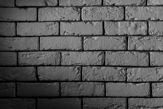 Textured brick white wall, clinker tiles rectangular.