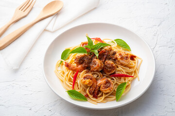 Stir-Fried Spaghetti With red curry paste and shrimp.Thai fusion food